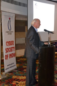 ISA President Larry Clinton speaks before the Cyber Society of India in 2013.