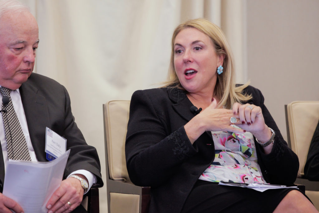 Cindy Fornelli, executive director of the Center for Audit Quality, shares the stage during the ISA 15th Anniversary Conference with Ken Daly, then the CEO of the National Association of Corporate Directorrs.