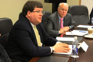 Chris Halterman (left), chair of the AICPA assurance Services Executive Committee, briefs the ISA board on how the profession is embracing a new approach to cybersecurity, turning away from “audits” to “assessments."